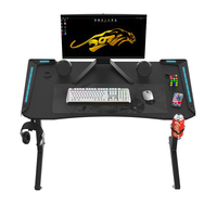 Bureau de jeu ergonomique en bois en forme de Z Wquantum avec porte-gobelet, crochet pour casque, surface en mélamine, assemblage requis, modèle Z10