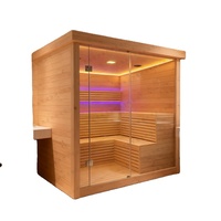 Salle de sauna infrarouge à spectre complet moderne avec construction en bois massif de pruche, capacité de 4 personnes et matériaux écologiques