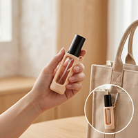 Flacon de parfum en silicone 12 ml, portable et rechargeable, à suspendre pour sacs – Nouveauté très demandée