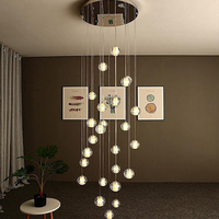 Lustre long d'escalier de Chrome d'acier inoxydable de boule de bulle en cristal de luxe caractéristique réglable de taille
