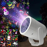 Lampe de projection LED RVB pas chère à 16 motifs, projecteur de flocons de neige, lumière colorée pour la décoration de la maison, lumière de fête pour les fêtes