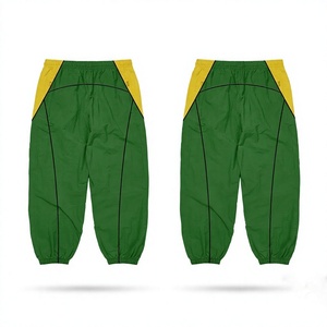 Pantalon coupe-vent pour femme en polyester premium 110 GSM, design à panneaux vert et jaune, impression de logo personnalisée, léger, style jogging sportif - Product Image 1