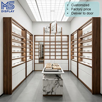 Meubles de présentation pour magasin d'optique sur mesure, étagère murale moderne à LED pour lunettes, table îlot pour lunettes de vue et de soleil, boutique de vente au détail