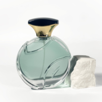Bouteille de parfum en verre gaufré transparente vide de 100ml de forme unique pour les soins de la peau emballage d'huile d'olive bouteille de parfum de luxe