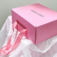 Boîte cadeau en papier rose écologique avec logo personnalisé et poignée en corde pour vêtements, t-shirts, robes, foulards, ceintures, emballage en gros