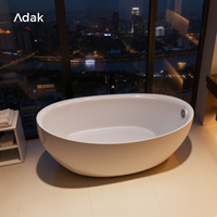 Baignoire autoportante portable écologique en acrylique à motif marbre, avec drain, aspect pierre de luxe, pour une immersion moderne en salle de bain intérieure