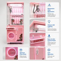 Machine à griffes rose bonbon avec force de préhension réglable pour la location dans les parcs d'attractions