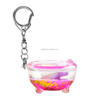 Porte-clés en forme de bouteille de liquide de bain à l'huile, mini porte-clés mignon, cristal, vente en gros, sac à dos, sac, pendentif flottant, décoration suspendue