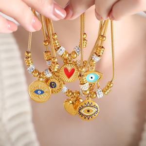 Pulsera de Oro de 18K con Ojo Turco y Ojo Griego, Lujo, Micro Pavé de Zirconia, Dijes de Ojo Griego, Cadena Ajustable, Brazalete con Dijes - Product Image 1