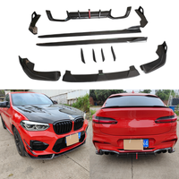 Kit carrosserie en fibre de carbone style AE amélioré pour BMW X4M 23-25 : Lame de pare-chocs avant, jupes latérales, diffuseur arrière et décoration de lame aérodynamique avant