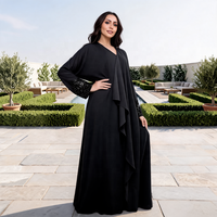 Abaya musulmane noire de luxe personnalisée pour femme, en polyester, élégante, avec poignets à sequins et panneau à volants, ouverte, modeste, pour l'automne, vente en gros à Dubaï, faible MOQ