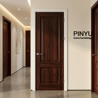 Armoire de chambre en bois massif avec cadre sculpté en noyer foncé, unité murale complète