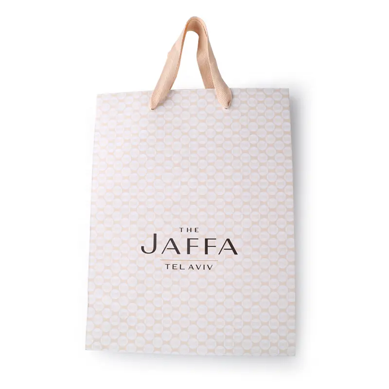 Sacchetto regalo di imballaggio ecologico personalizzato per vestiti sacchetto di carta bianca di lusso sacchetto della spesa color crema con manico a nastro