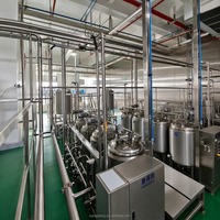 Ligne de production automatique de lait de soja Kangdeli avec système de cuisson à micro-pression et de séparation par broyage céramique