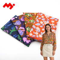 Tissu imprimé floral vintage 100% coton avec des motifs de fleurs mélangées lavande pour robe