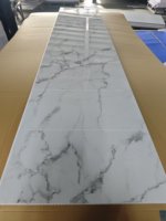 Panneaux muraux en plastique effet carrelage béton, motif nuages dorés