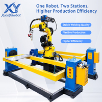 Cellule de soudage MIG modulaire à double poste pour robot unique, portée de 1,5 m avec positionneur de tourelle et de contre-tourelle