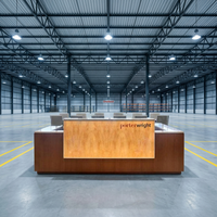 Comptoirs de réception de bureau et de centre muséal en pierre translucide rétroéclairée à LED