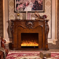 Cheminée antique en bois sculpté à la main de couleur brune avec insert électrique