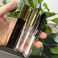 Boîte personnalisée logo 4ml tube de brillant à lèvres rond en plastique or noir, récipient transparent pour brillant à lèvres avec capuchon noir doré