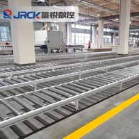Ligne d'assemblage à rouleaux électriques en acier inoxydable avec bande transporteuse et tables de travail