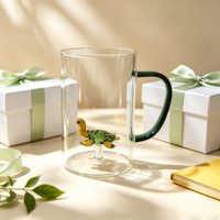 Tasses en verre résistant à la chaleur, tasse en verre transparent soufflé à la main avec une petite tortue 3D à l'intérieur, verre à boire avec poignée verte pour le café et l'eau