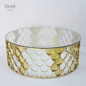 Nouvelle <span class=keywords><strong>table</strong></span> <span class=keywords><strong>basse</strong></span> ronde dorée avec <span class=keywords><strong>d</strong></span>écoration en écailles de <span class=keywords><strong>poisson</strong></span> - Product Image 2