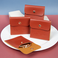 8*8cm Unique Bargains Pochettes de rangement pour bijoux miniatures en cuir PU orange souple avec bouton pression doré, logo en relief portable