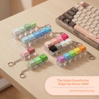 Porte-clés anti-stress en PVC style clavier macaron à quatre boutons, avec touches lumineuses – Jouet de décompression DIY pour tous les âges