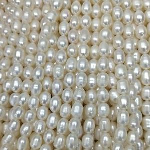ขายส่งไข่มุกน้ำจืดคุณภาพสูงขนาด 7-8 มม. แบบไร้สารกัมมันต์ รูปทรงเม็ดข้าว สำหรับทำสร้อยคอแบบกึ่งสำเร็จรูป - Product Image 1