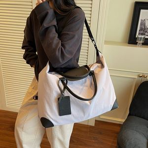 Sacs de voyage unisexes personnalisés avec logo de marque, sacs de rangement pour bagages de couleur unie simple, sacs fourre-tout de grande capacité pour voyager - Product Image 6