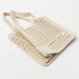 Bolso de mano de malla hueca de ganchillo para mujer, con logotipo personalizado, venta al por mayor, para playa - Product Image 2