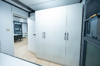 Maison conteneur extensible à deux étages et double aile, étanche, isolée, à montage rapide, structure en acier, préfabriquée, utilisable en toutes conditions climatiques