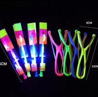 Boyid Jouet volant rotatif d'extérieur de Noël, fusée lumineuse LED clignotante, hélicoptère élastique à catapulte, flèche, cadeau pour enfants