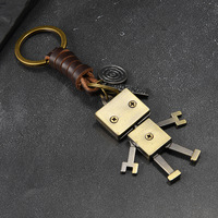 Beweglicher Roboter-Schlüsselanhänger Retro Geflochtenes Leder und Legierungsanhänger Kreatives Personalisiertes Geschenk