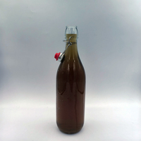 Botella de Vidrio Transparente Redonda de 1000 ml, 500 g, 1 L, Juego Completo a Precio Económico, con Tapa Abatible y Tapón Metálico
