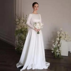 ชุดแต่งงานสีขาวทรงเอไลน์แบบเรียบง่าย คอทรงโอ แขนยาว ชุดเจ้าสาวปี 2025 สไตล์โบโฮ ชุดราตรีงานแต่งงานริมชายหาด สามารถสั่งตัดได้ - Product Image 1