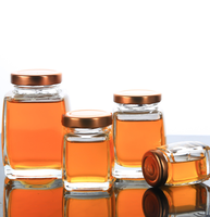 Pot en verre rond à large ouverture avec couvercle à vis électro-plaqué pour complément alimentaire en capsules de miel haut de gamme 50 100 75 180 280 360 ml en plastique