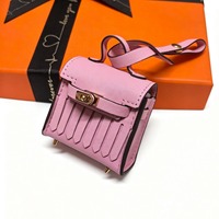 Sac de rangement haut de gamme en cuir PU pour écouteurs, avec pendentif pompon et mini pendentif clé Kelly Charter mignon pour femme