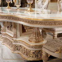 Longue table à manger sculptée en bois massif de style européen avec chaise de salle à manger en tissu pour restaurant français ou meubles de villa d'hôtel