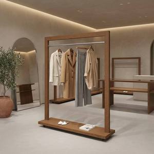 Expositor de Ropa Personalizado de Lujo en Madera y Metal con Superficie Electrochapada y Protección Contra la Corrosión para Tiendas de Ropa - Product Image 4