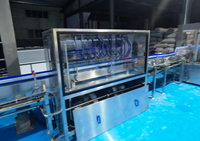 Machine de remplissage d'eau en bouteille à 32 têtes d'occasion, ligne de production d'eau en bouteille, machine d'embouteillage d'eau