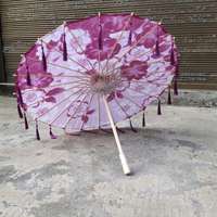 Parapluie en papier fait main, résistant à la pluie et au vent, avec poignée et pompons, motif fleur de prunier, peinture à l'huile chinoise, idéal pour la danse