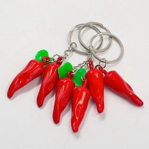 Dos chiles por un dólar, accesorios de llavero con forma de chile, artículos de vendedor callejero a un dólar cada uno. - Product Image 1