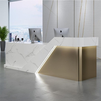Bureau d'accueil en pierre de marbre Corian Banc de réception d'hôtel en acier inoxydable doré Bureau de réception en fausse pierre