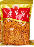 Cordyceps militaris en gros, jaune doré, séché, épice brute, herbe entière en bâtonnets