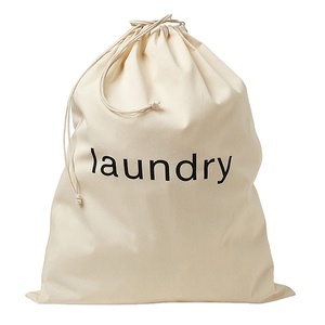 Bolsa de Lavandería Portátil de Tela de Lona de Algodón con Cordón, Biodegradable, Color Beige Natural - Product Image 1