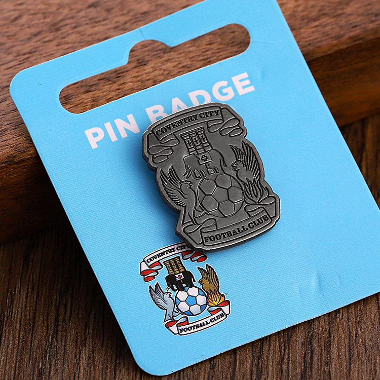 Black nickel plated metal badge