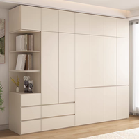 Armoire de chambre blanche moderne avec portes battantes et miroir, sans poignée à bouton