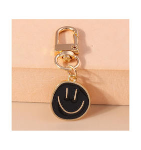 Métal Émail Sourire <span class=keywords><strong>Expression</strong></span> Heureux Visage Souriant Porte-clés Porte-clés Pour Écouteur Cas Bourse Décoration - Product Image 5